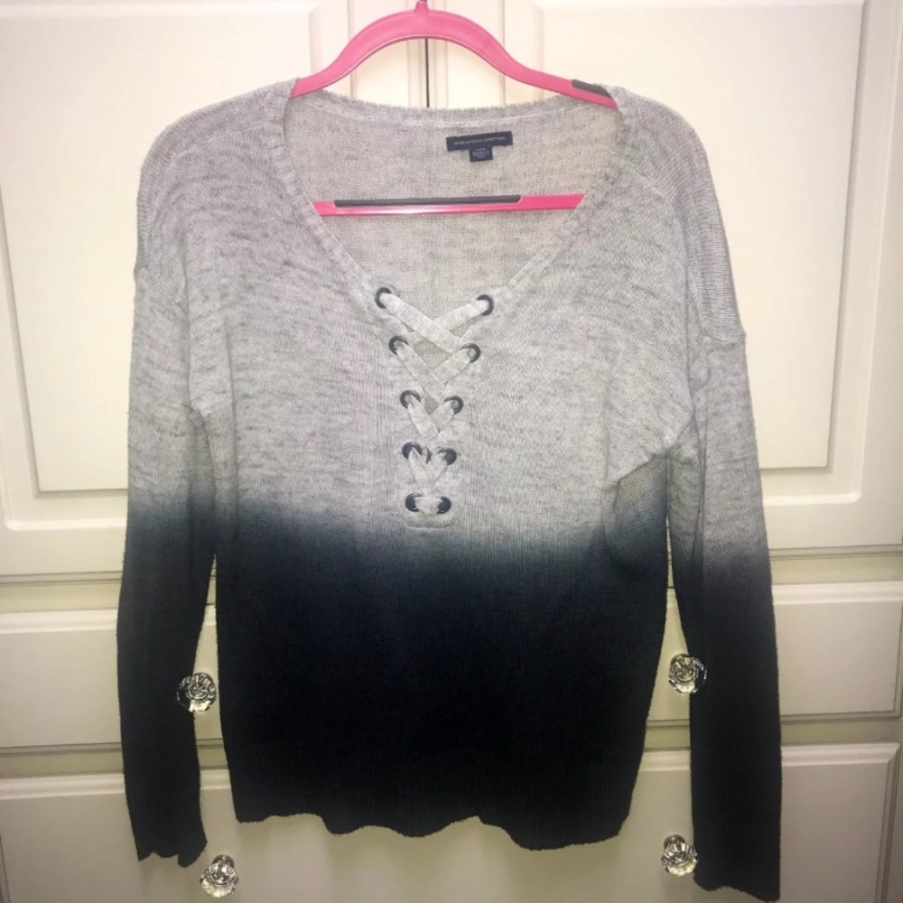 Adorable cross neck sweater